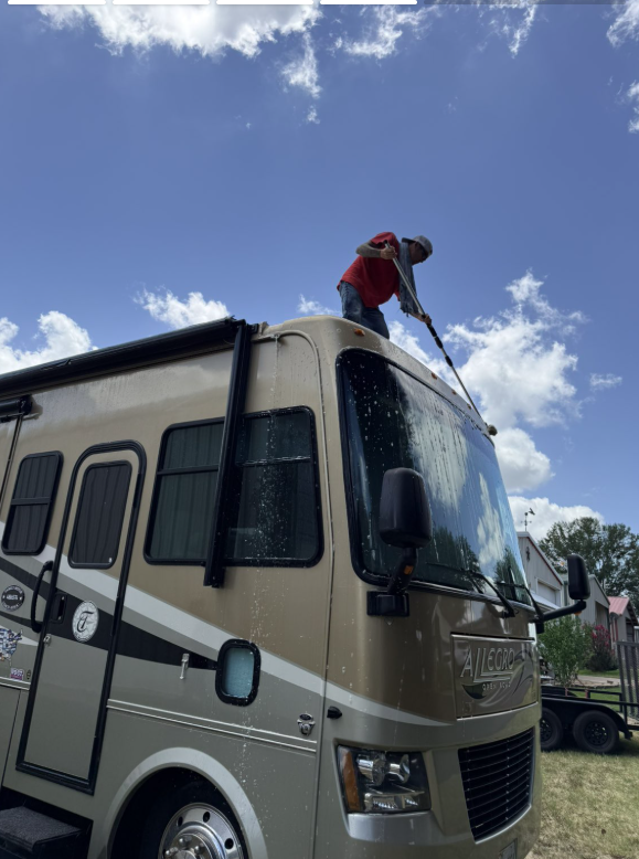 Washing the roof of a Class A motorhome in East Texas
